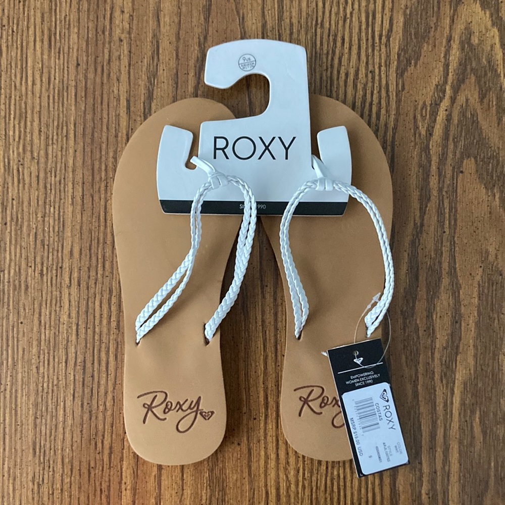Roxy women’s flip flop- white, size 9
